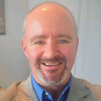 Headshot of Michael Wynston from Fiserv