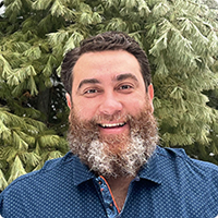 Headshot of John Capobianco, Head of AI and Developer Relations at Itential, helping organizations adopt AI safely in network automation with deep experience across enterprise, government, and cloud networking.