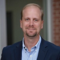 Headshot of Dalton Smith, Senior Solutions Engineer at Itential, helping customers scale network automation and orchestration with 20+ years of networking experience.