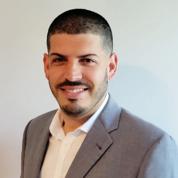 Headshot of Joksan Flores, Principal Solutions Engineer at Itential, advancing infrastructure automation through AI-driven orchestration with 10+ years of networking architecture experience at Cisco.