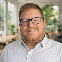 Headshot of Donnie Page, Senior Solutions Engineer at Itential, helping enterprises operationalize AI-native infrastructure, platform engineering, and agentic AI with 15+ years of cloud and automation experience.