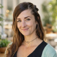 Headshot of Holly Holcomb, Head of Customer Success at Itential, leading strategic partnerships and helping customers scale network automation investments with expertise in program delivery and change management.