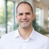 Headshot of Michael Elrom, VP of Professional Services at Itential, bringing 20+ years of network automation and IT infrastructure expertise to help customers accelerate their automation journey.
